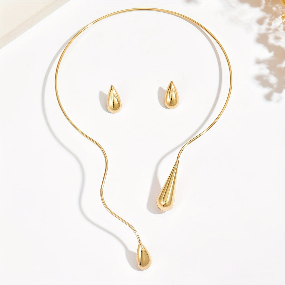 Taliah™ Elegant Necklace and Earring Set with Asymmetrical Drop Design